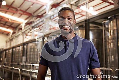 Portrait of a young black man working at a wine factory Stock Photo