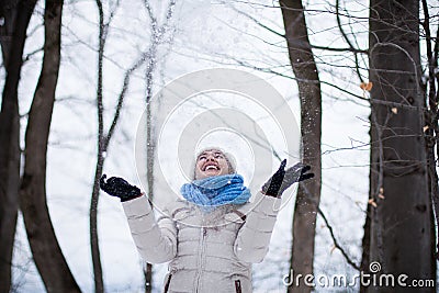 Portrait of a young blonde woman outdoors in winter Stock Photo