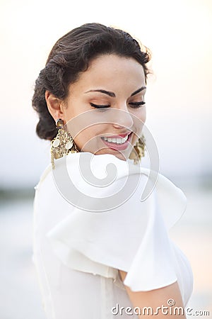 Portrait young bride with brunette hair in white wedding dress a Stock Photo