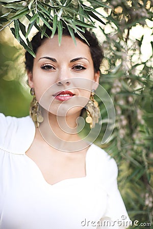 Portrait young bride with brunette hair in white wedding dress a Stock Photo