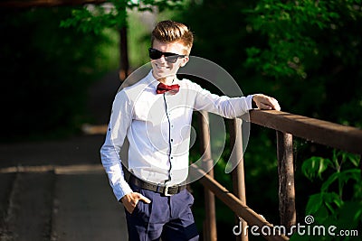 Portrait of a young business coach confident in himself. Serious smiling happy successful positive businessman Stock Photo