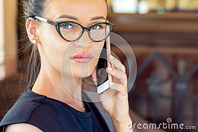 Business woman talking on mobile phone Stock Photo