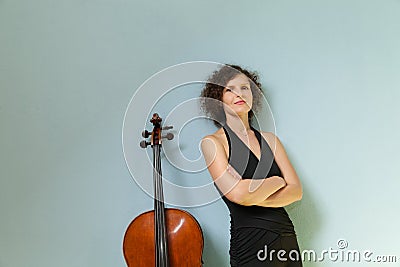 Portrait of young cellist Stock Photo