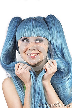 Portrait of young cute woman with blue hair Stock Photo