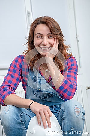 Portrait of young engineer woman with safety hard hat Stock Photo