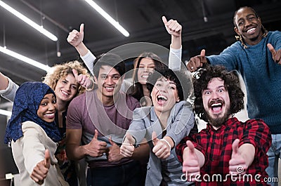 Portrait of young excited multiethnics business team Stock Photo