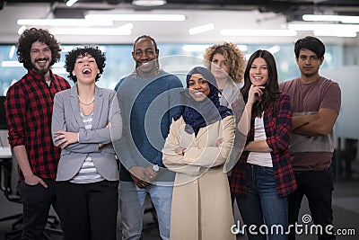 Portrait of young excited multiethnics business team Stock Photo