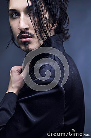 Portrait of young fashion macho. Stock Photo