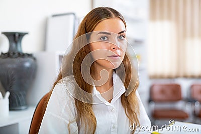 Portrait of young female clerical worker Stock Photo