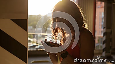 Portrait of young female in glasses and with curly hair Stock Photo