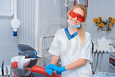 Portrait of a young girl dentist in the office. Dentist at the workplace Stock Photo