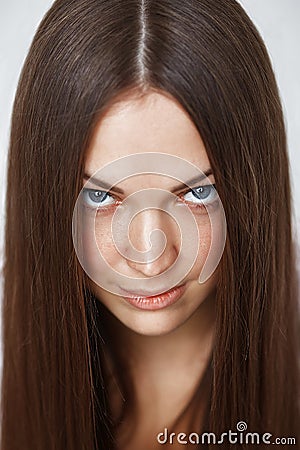 Portrait of a young girl with eyes like gimlets Stock Photo