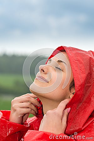 Portrait of young girl feeling the rain Stock Photo