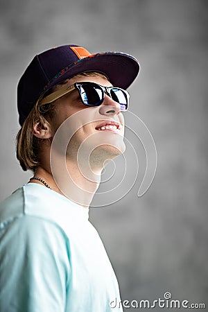 Goodlooking man in a cap Stock Photo