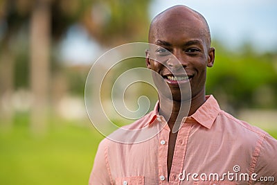 Portrait young handsome businessman with pink button shirt unbuttoned Stock Photo