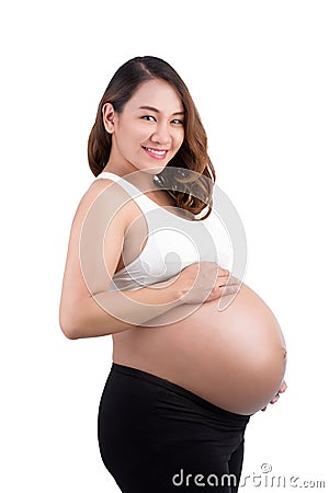 Portrait of the young happy smiling pregnant woman Stock Photo