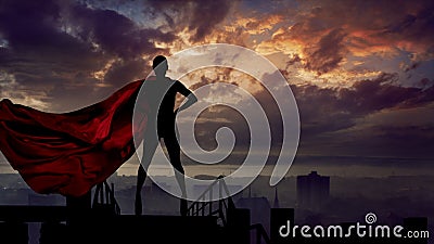 Portrait of young hero woman with super person red cape guard city Stock Photo