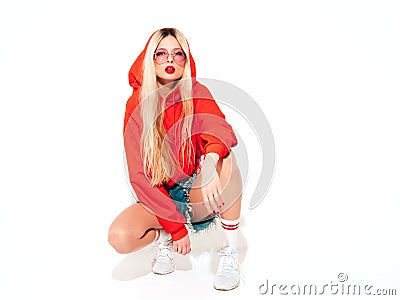 Portrait of young hipster girl posing in studio Stock Photo