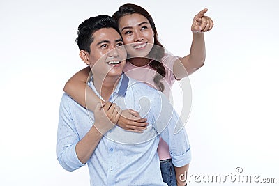 Portrait of young interracial couple, hispanic man and asian girl Stock Photo