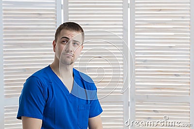 Portrait of a young male doctor in a medical office Stock Photo