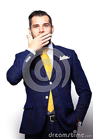 Portrait of young man with shocked facial expression Stock Photo