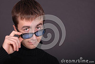 Portrait of young man wearing glasses Stock Photo
