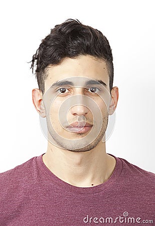 Portrait of young Middle Eastern man over white background Stock Photo