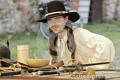 Portrait of young musketeer with hat. 9th July 2011, CESKY RUDOLEC. CZECH REPUBLIC Editorial Stock Photo