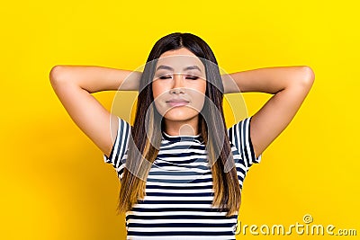 Portrait of young relaxed funny chinese girl hands head closed eyes take nap after university lectures isolated on Stock Photo