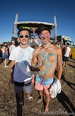 Portrait of a young smiling man on holi color Editorial Stock Photo