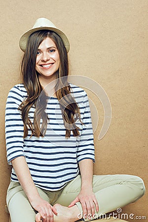 Portrait of young smiling woman wearing hat Stock Photo