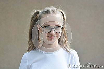 Portrait of young teenager girl isolated on gray background Stock Photo