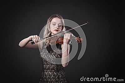 Portrait of a young violinist Stock Photo