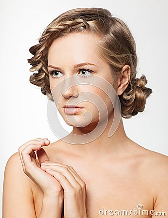 Portrait of young woman with braid hairdo Stock Photo