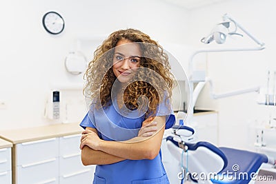 Portrait of young woman dentist at private dental clinic. Stock Photo