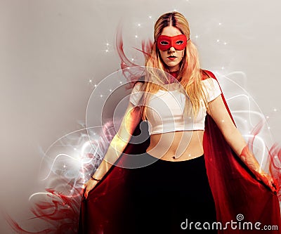 Portrait of a young woman dressed as superhero Stock Photo