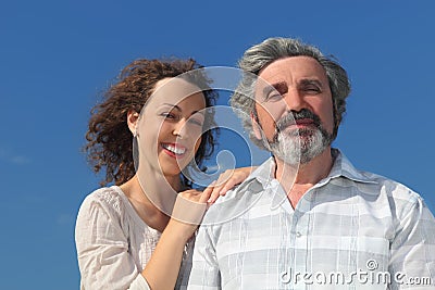 Portrait of young woman embracing her father Stock Photo