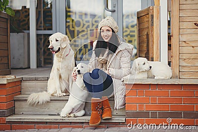 Portrait of the young woman with favourite dogs Stock Photo