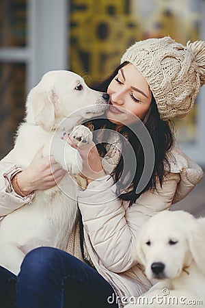 Portrait of the young woman with favourite dogs Stock Photo