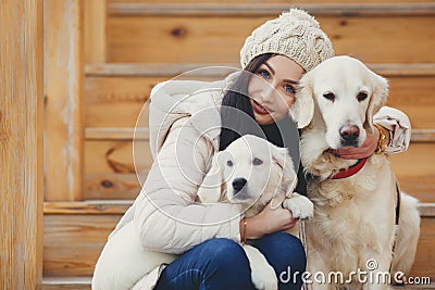 Portrait of the young woman with favourite dogs Stock Photo