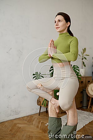 Portrait of young woman practicing yoga mindfulness technique Stock Photo