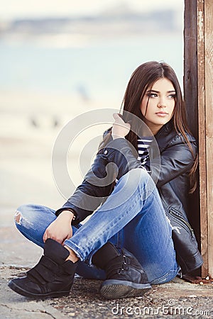https://thumbs.dreamstime.com/x/portrait-young-woman-sitting-sidewalk-beautiful-girl-caucasian-appearance-dark-long-straight-hair-brown-eyes-50049182.jpg