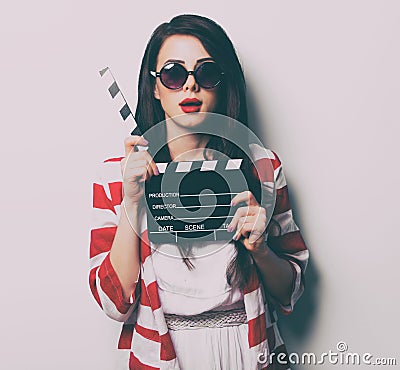 Portrait of the young woman with slapstick Stock Photo