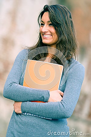 Portrait of young,woman student in the park Stock Photo