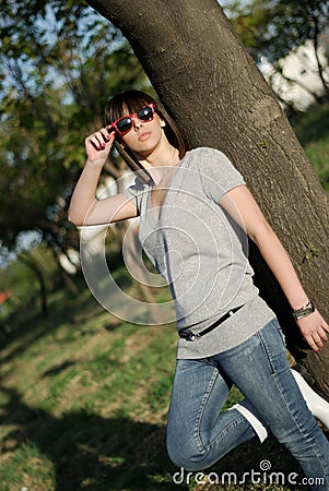 Portrait of a young woman with sunglasses Stock Photo