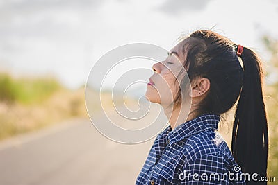 portrait of young woman take a deep breath Stock Photo