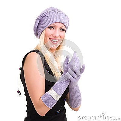 Woman in white knit wool hat and mittens Stock Photo