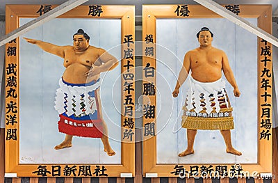 Portraits of Japanese professional sumo wrestlers Yokozuna champions in Ryogoku station. Editorial Stock Photo