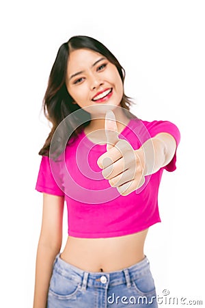 Portraits of young Asian women. Thumbs up With a smiling face happily, a beautiful woman with a sense of self-confidence, looks Stock Photo