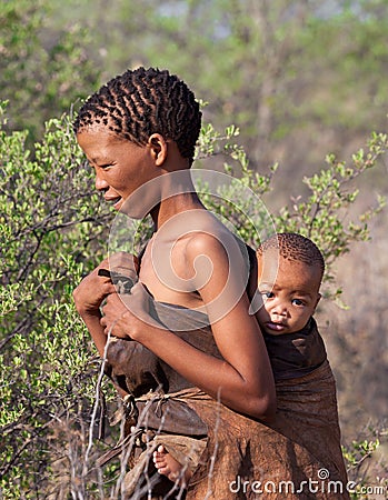 Portrate of Bushman woman with child in Botswana Editorial Stock Photo